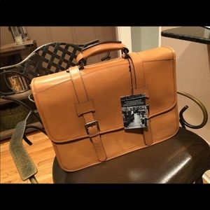 Korchmar leather messenger. Never used with tags.